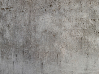 Obraz premium Texture of rough gray concrete surface with scratches