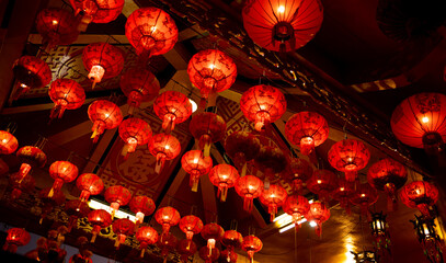 Red lanterns hanging on Chinese temple roof