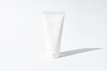 mockup of white squeeze bottle plastic tube for branding of medicine or cosmetics - cream, gel,...
