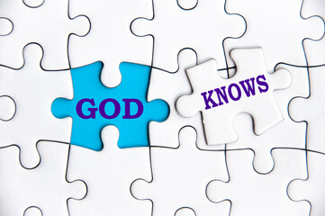 God knows text on missing jigsaw. Christianity and religion concept