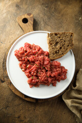Homemade steak tartare with rye bread