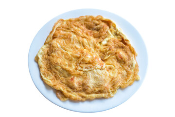 Closeup of a simple egg omelet and plate isolated on white background. This has clipping path.