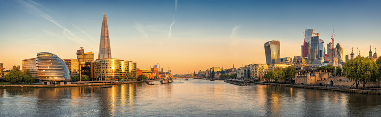 the skyline of london during sunrise