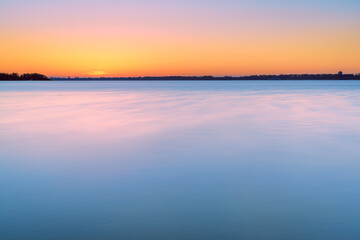 Fototapeta na wymiar View of the lake Veluwemeer during sunrise