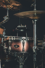Close-up, part of a drum kit on a blurred background.