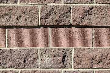 Facing volumetric brown brick for exterior facades