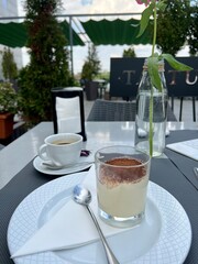 tiramisu in a glass and coffee