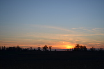 Obraz na płótnie Canvas Cool sunset seen in Mazury, Poland, olecko