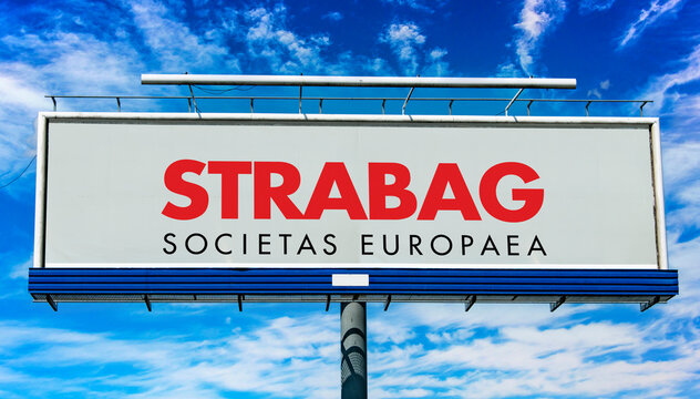 Advertisement billboard displaying logo of STRABAG
