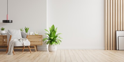 Interior with a gray armchair on empty white wall background.
