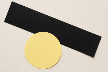 yellow circle over black bar