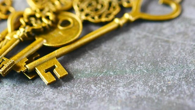many old keys on table close up 