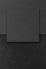 Black rectangular mockups on a dark concrete background. Design elements or portfolio. Copy space.