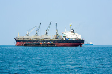 oil tanker container ship at sea. Crude oil tanker lpg ngv at industrial estate Thailand - Oil...