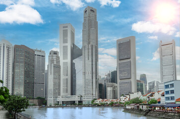 Fototapeta na wymiar Downtown, business center of modern city. Cityscape of Singapore. Urban landscape of Singapore. Panorama downtown and clark quay promenade. sunny sky