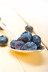 fresh blueberry on silver spoon