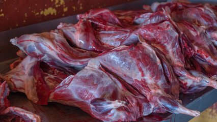 Butchered beaver carcasses. A hunting trophy. Bloody fresh beaver meat during butchering.