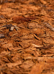 Compressed bale of ground coconut shell fibers ,coir, surface background