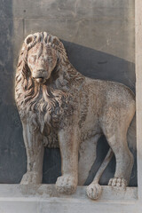 Fototapeta na wymiar Venezia. Altorilievo con leone Marciano sulla facciata della omonima Scuola Grande