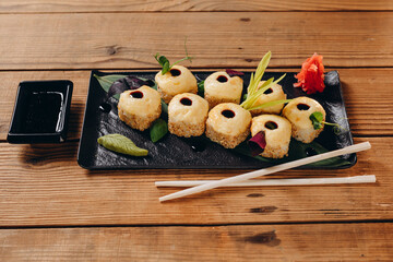 There is a plate of a new sushi of the Chinese restaurant.
