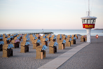 German coast of baltic sea with beach chairs and DLRG (German Life Saving Association)