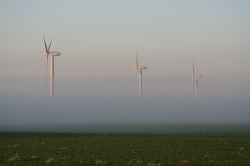 windmills in the fog