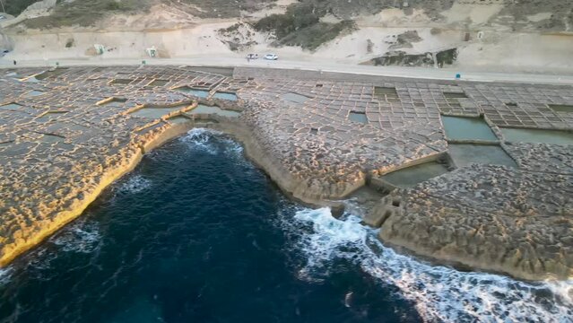 Aerial sunset view of Salt Pans in Zebbug, Gozo