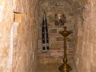 Cells for the priest's prayer. A place in an ancient temple for religious rites. A place for...