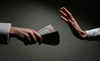 Committing a crime. Closeup image of businessman taking stack of money as bribe. Executive taking money, bribery and illegal business among senior officials. corrupt practices. corruption. bribe.