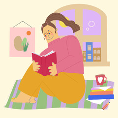 Young adult woman sit on carpet reading a book leisure relax satisfaction life moment at home