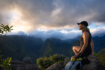 woman on the top in the mountains