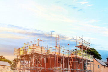 Scaffolding around houses on a new housing development