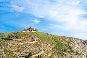 Views of the hermitage of Sant Crist, with the Calvary of ascent. In Bocairent (Valencia, Spain).