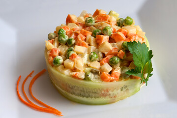 Olivier salad with vegetables and meat.  Selective focus