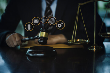 Concepts of Law and Legal services. Lawyer working with law interface icons. Blurred background.	