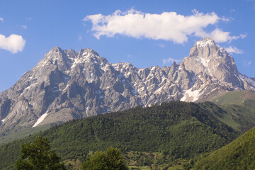 Fototapeta na wymiar Ushba is one of the peaks of the Greater Caucasus in the Georgian region of Samegrelo-Upper Svaneti