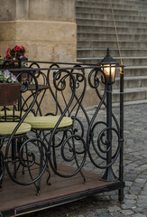 Fototapeta na wymiar Fragment of a terrace in a cafe near Prague Castle.