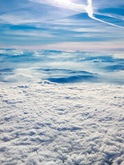 Aerial view of the Tatra Mountains above the clouds,  Poland