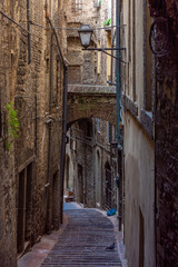 Fototapeta na wymiar Medieval street in Perugia historic center, Umbria Italy