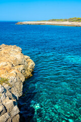 PORTO SELVAGGIO, ITALY, 15 AUGUST 2021 Crystal clear water in the beach of Porto Selvaggio