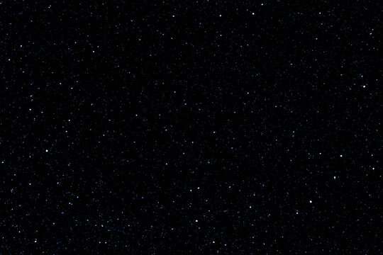 Starry night sky.  Galaxy space background.  Dark blue night sky with stars.