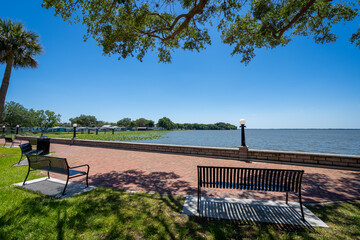 Lakeside benches at Ferran Park on Lake Eustis in downtown Eustis, Florida