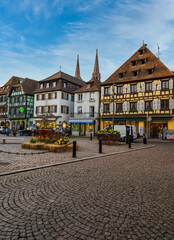 Obernai streets with beautiful historical german architecture colorful houses during spring