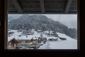 View of the winter landscape through the window.