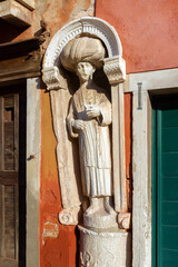 Statue of an arab at the entrance to the historic home of the famous Venetian painter Tintoretto in Canareggio