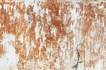 Background rusty iron sheet stained with white paint with red spots of rust and destruction...