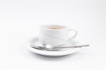 a white tea set with teapot tea and saucers and pie for breakfast