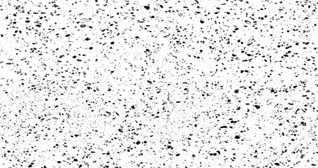 Small uneven spots and particles of debris. Abstract vector texture. Distressed uneven background. Grunge texture overlay with fine grains isolated on white background. Vector illustration. EPS10.
