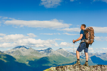 Hiker on the mountain ridge. Sport and active life concept