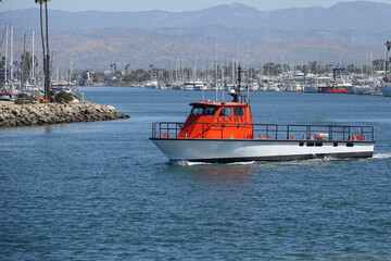 approaching motorboat Coast Guard in the harbor